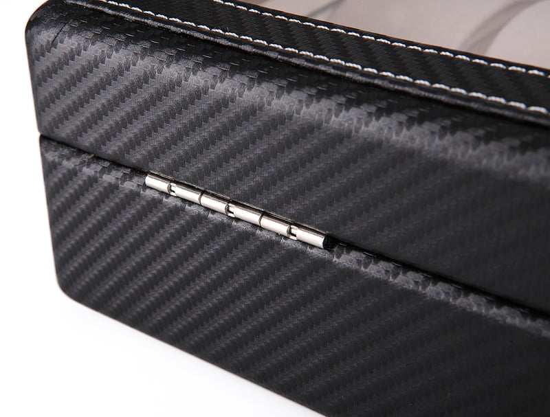 Black carbon fiber watch case with rear metal hinge and contrast stitching