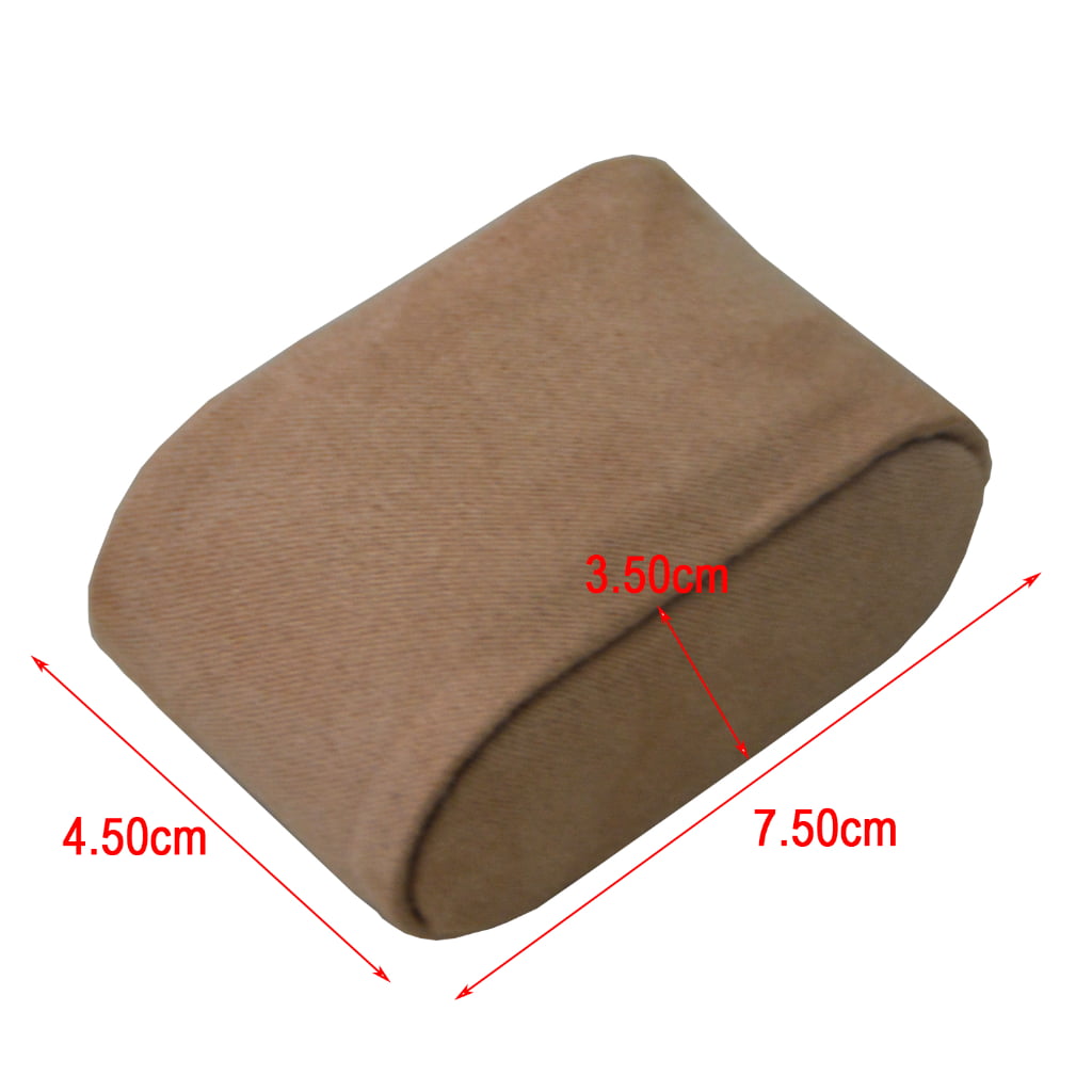 Apricot velvet watch pillow measuring 7.5 cm by 4.5 cm by 3.5 cm
