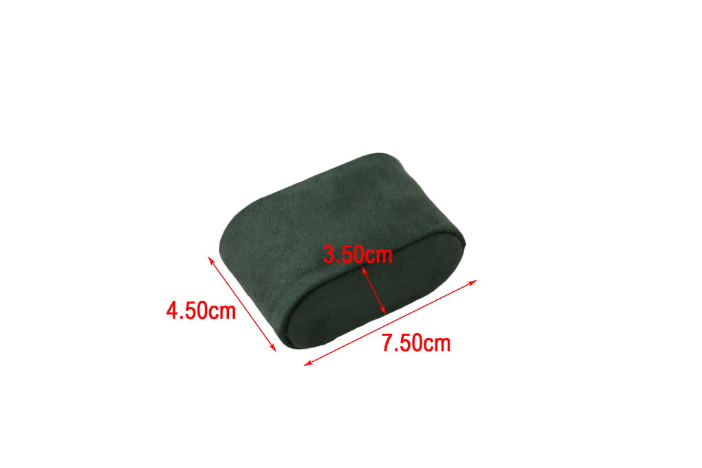 Green velvet watch pillow measuring 7.5 cm by 4.5 cm by 3.5 cm