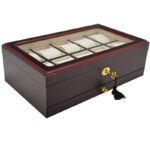 Closed 10 watch case with cherry red exterior, tempered glass window and gold-tone hardware