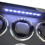 6 watch winder interior detail with black watch cushion, circular winding compartment and LED light