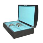 Watch display case hinge detail with carbon fibre exterior and velvet interior