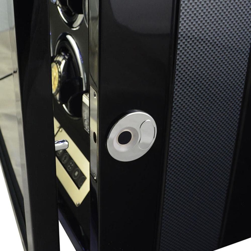 Close-up of 4 watch winder fingerprint lock beside carbon fibre exterior panel