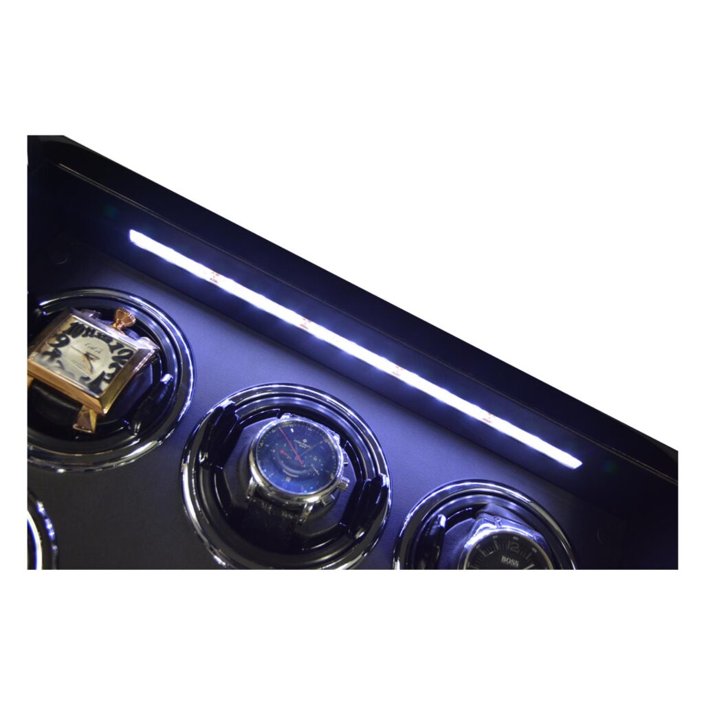 12 watch winder interior detail with LED light illuminating watch winding positions
