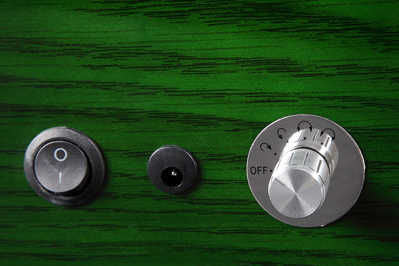 Green watch winder with rotation control knob and power switch