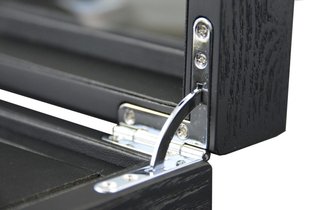 Wooden perfume case hinge detail with black exterior finish