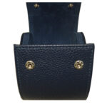 Open pebbled PU leather watch roll showing snap button closure