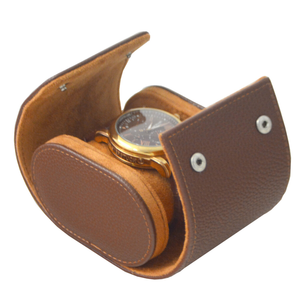 Open brown pebbled grain PU leather travel box holding one watch