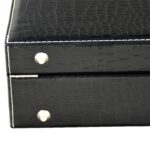 Close-up of crocodile grain PU leather watch case surface and stitching detail