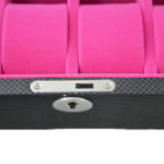 Watch case interior showing velvet cushions and storage compartments