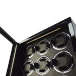 9 watch winder interior with LED light above black watch cushions and winding positions
