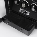 Watch winder storage drawer with remote control and black interior compartments