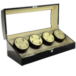 Automatic watch winder case showing multiple winding positions and storage compartments