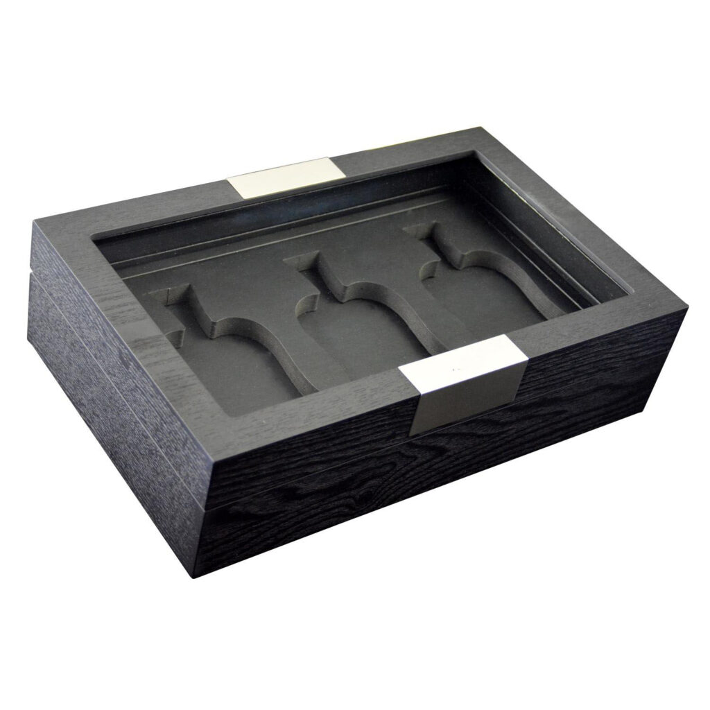 Wooden perfume display case open with black interior and bottle positions