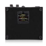 Bottom view of black wood watch winder case with battery compartment