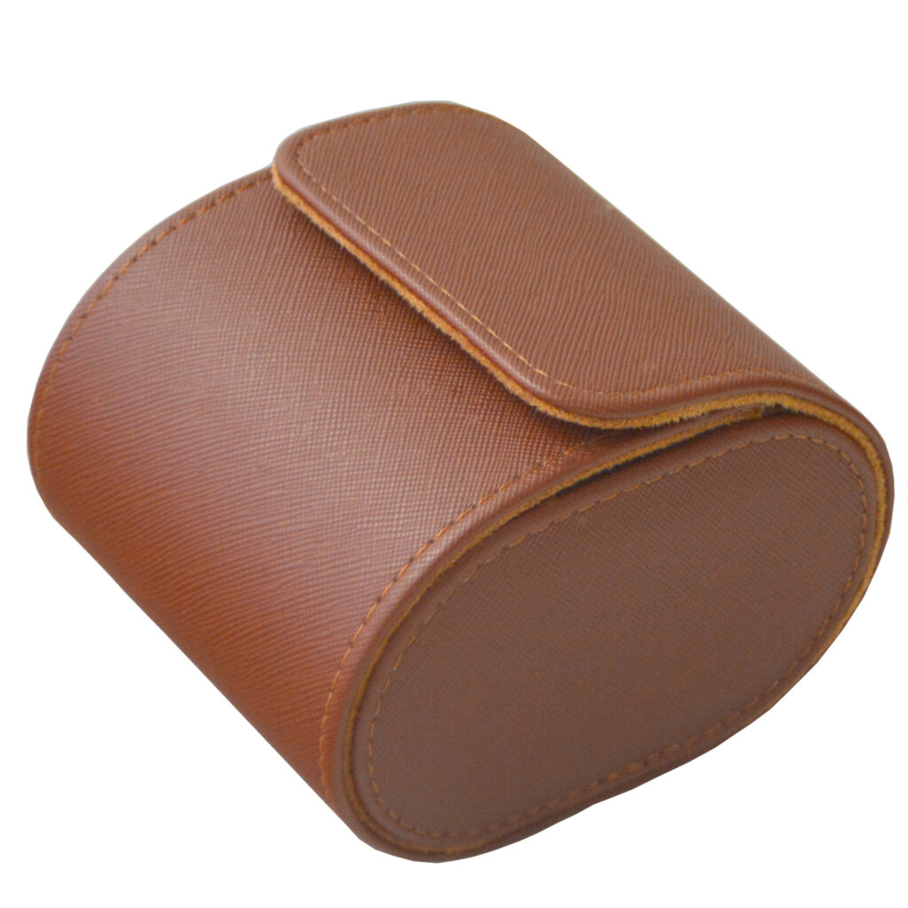 brown single watch travel box with watch and snap button closure
