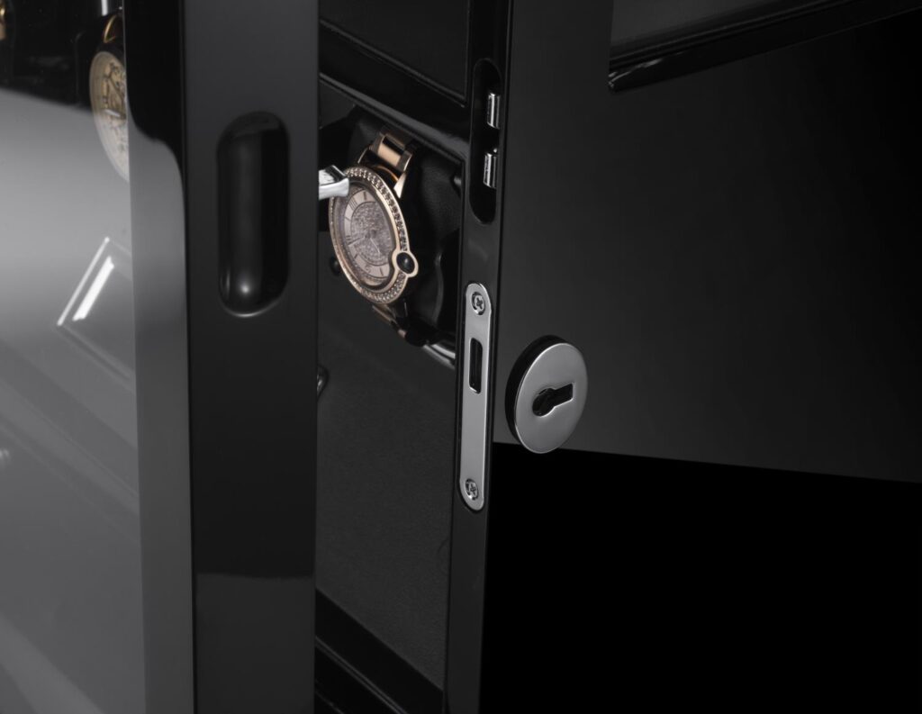 Watch winder case door lock detail with black lacquered finish