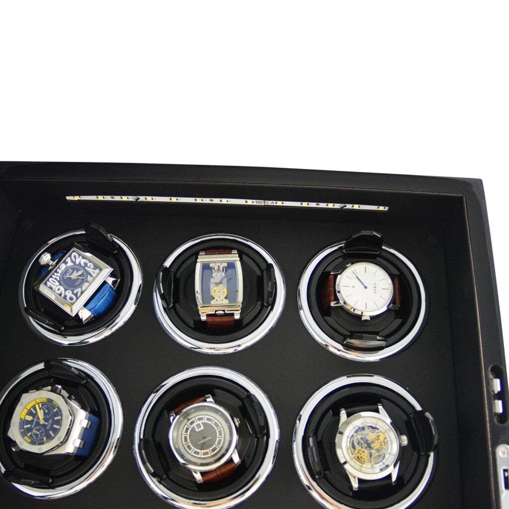 9 watch winder interior detail with black winding compartments and LED light strip