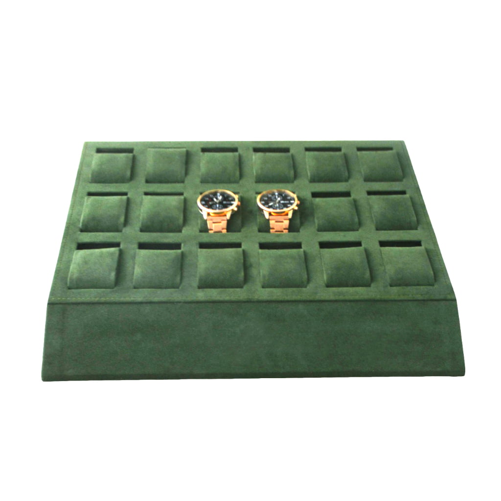 Green velvet watch presentation tray with organized slots