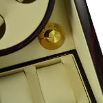 Custom watch winder knob detail with tempered glass display panel for watch presentation
