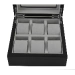 Open carbon fiber 6-watch box with six grey cushions and divided velvet interior