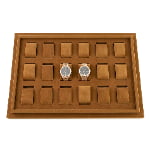 Velvet watch display tray showing watches in compartments