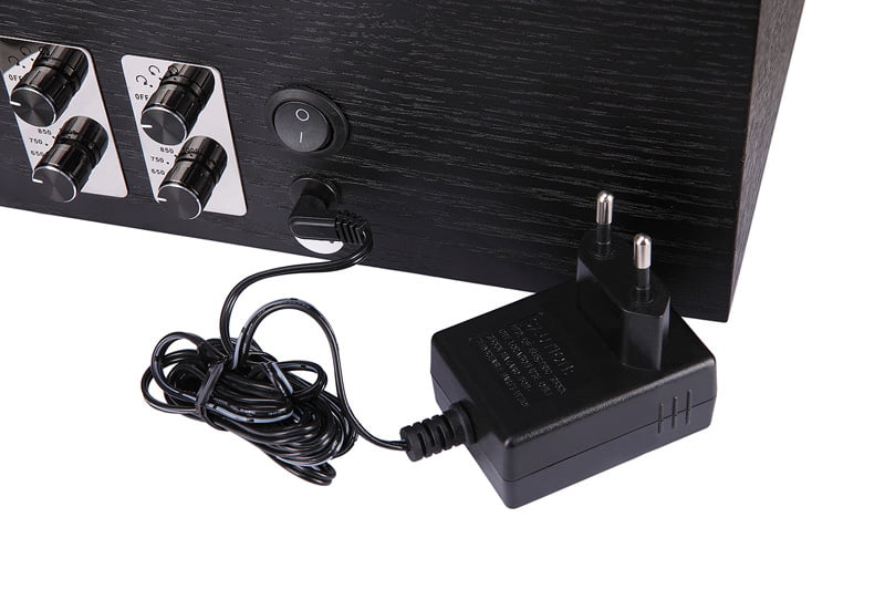 Watch winder case showing power adapter and control settings
