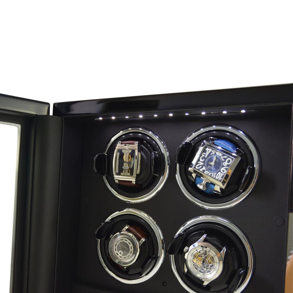 Black 4 watch winder interior displaying four watches beneath integrated LED lighting