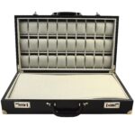 Open watch display case with multiple compartments and apricot velvet interior