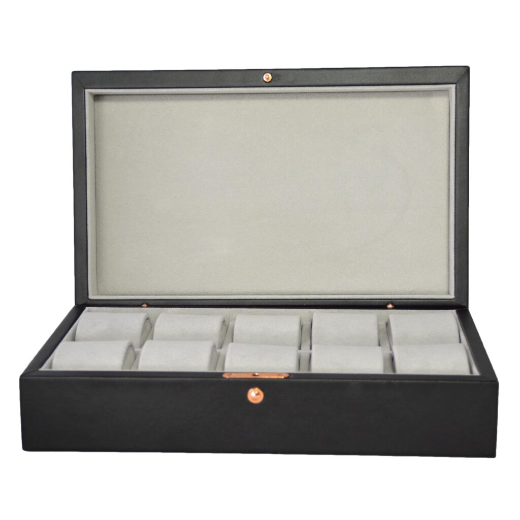 Watch box with metal snap button closure detail on PU leather exterior