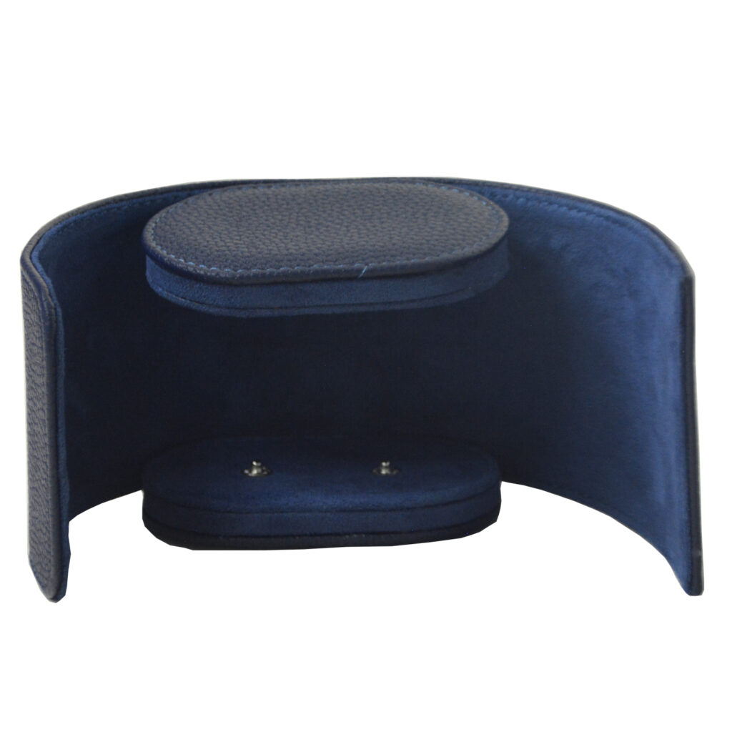 Open single watch roll with blue velvet-lined interior and watch cushion
