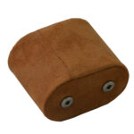Brown velvet watch cushion showing two snap button fasteners