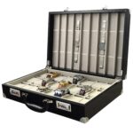 Open 24 watch suitcase showing beige velvet interior and individual watch compartments