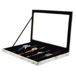 Marble white watch display case with multiple watches displayed