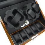 Automatic watch winder box showing multiple winding positions and storage compartments