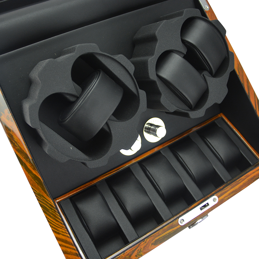 Automatic watch winder box showing multiple winding positions and storage compartments