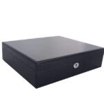 Black leather watch strap storage case angled view with structured design