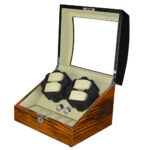 Automatic watch winder box showing four winding positions and storage compartments