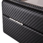 Carbon fiber watch case exterior with close-up metal hinge detail