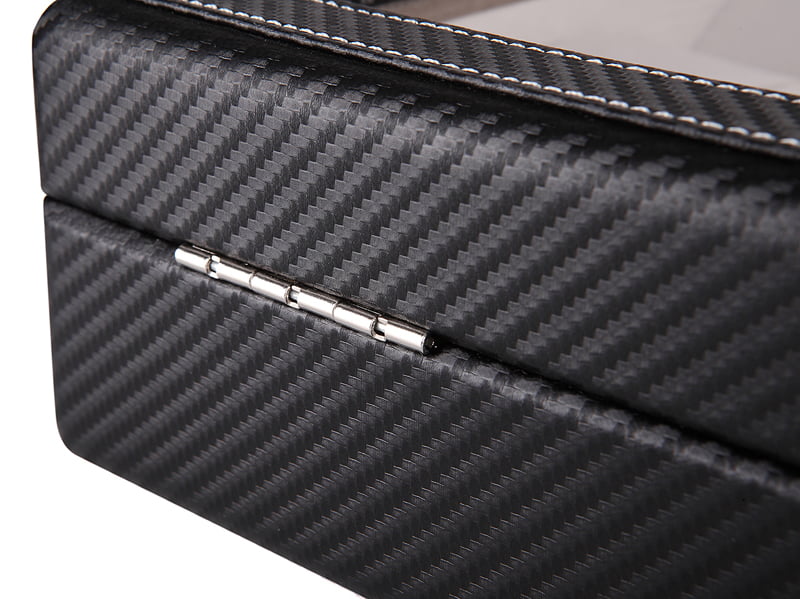 Carbon fiber watch case exterior with close-up metal hinge detail