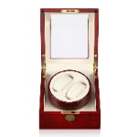 Red lacquer watch winder with beige interior and acrylic display window