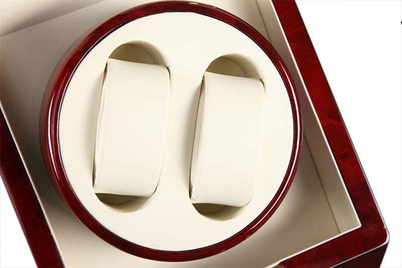 Dual slot watch winder interior with two beige watch cushions