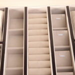 Jewelry organizer interior with divided compartments for accessories