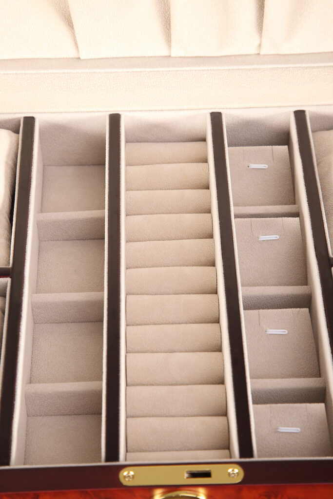 Jewelry organizer interior with divided compartments for accessories