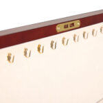 Wooden jewelry box interior with necklace hook panel and velvet lining