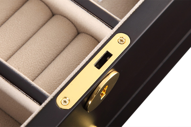 Jewelry box interior showing ring rolls earring panel and necklace storage
