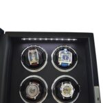 Black 6 watch winder interior showing watches in winding positions beneath LED lighting