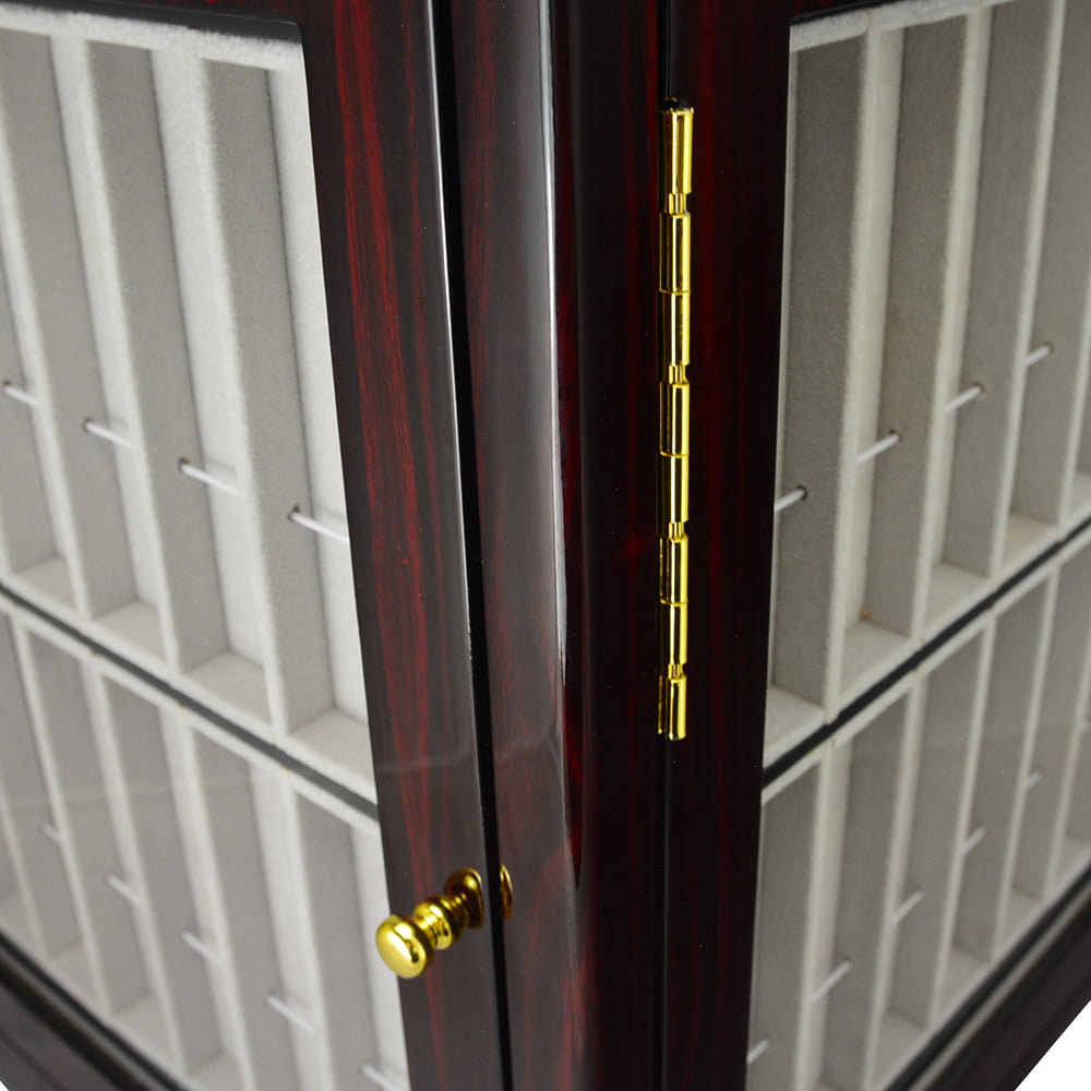 Ebony watch strap display cabinet close-up with gold-tone hinge and beige divided interior