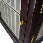 Ebony watch strap cabinet close-up showing gold-tone door knob, hinge and acrylic display panel
