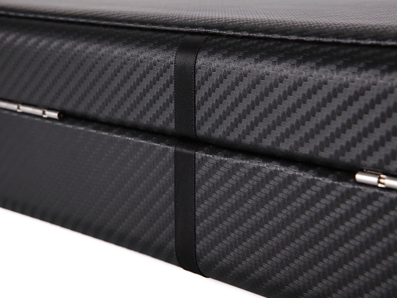 Watch case material detail showing textured black exterior surface